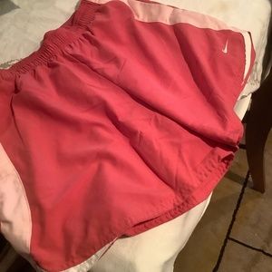 Ladies Nike rose colored running shorts